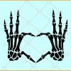 Skeleton hands love heart symbol svg